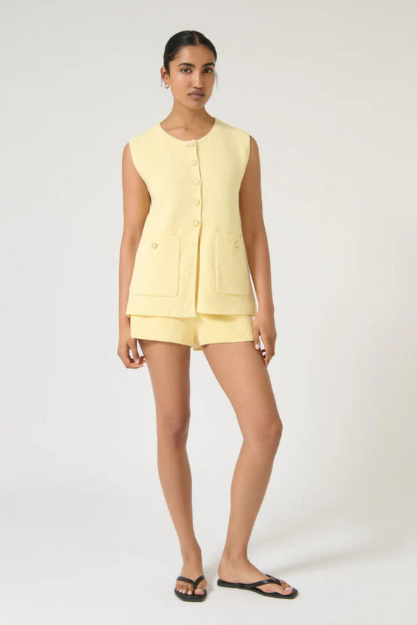 Helena Gilet by Onte, butter cotton crochet knit vest with enamel gold buttons and a relaxed sleeveless fit, perfect for layering.