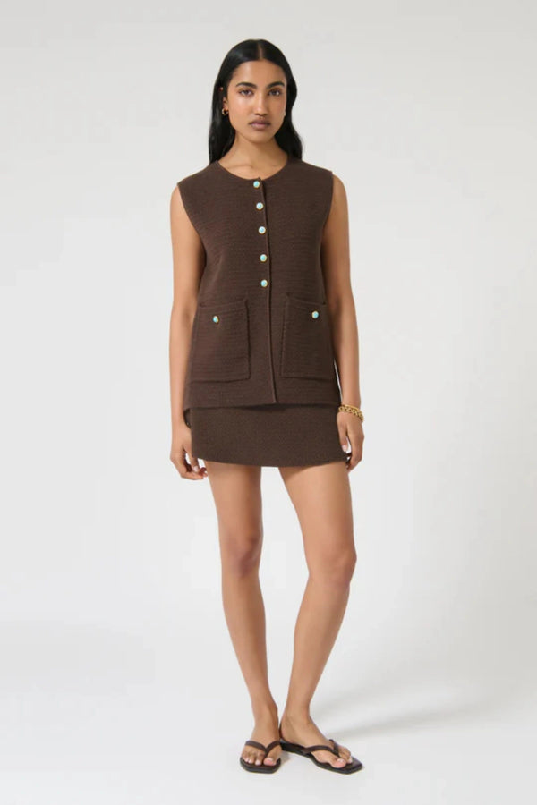 Helena Skirt – Chocolate by Onte, a crochet-knit mini with stretch waist. Perfect for styling with the matching Helena Gilet.