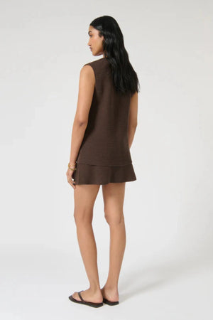 Helena Skirt – Chocolate by Onte, a crochet-knit mini with stretch waist. Perfect for styling with the matching Helena Gilet.