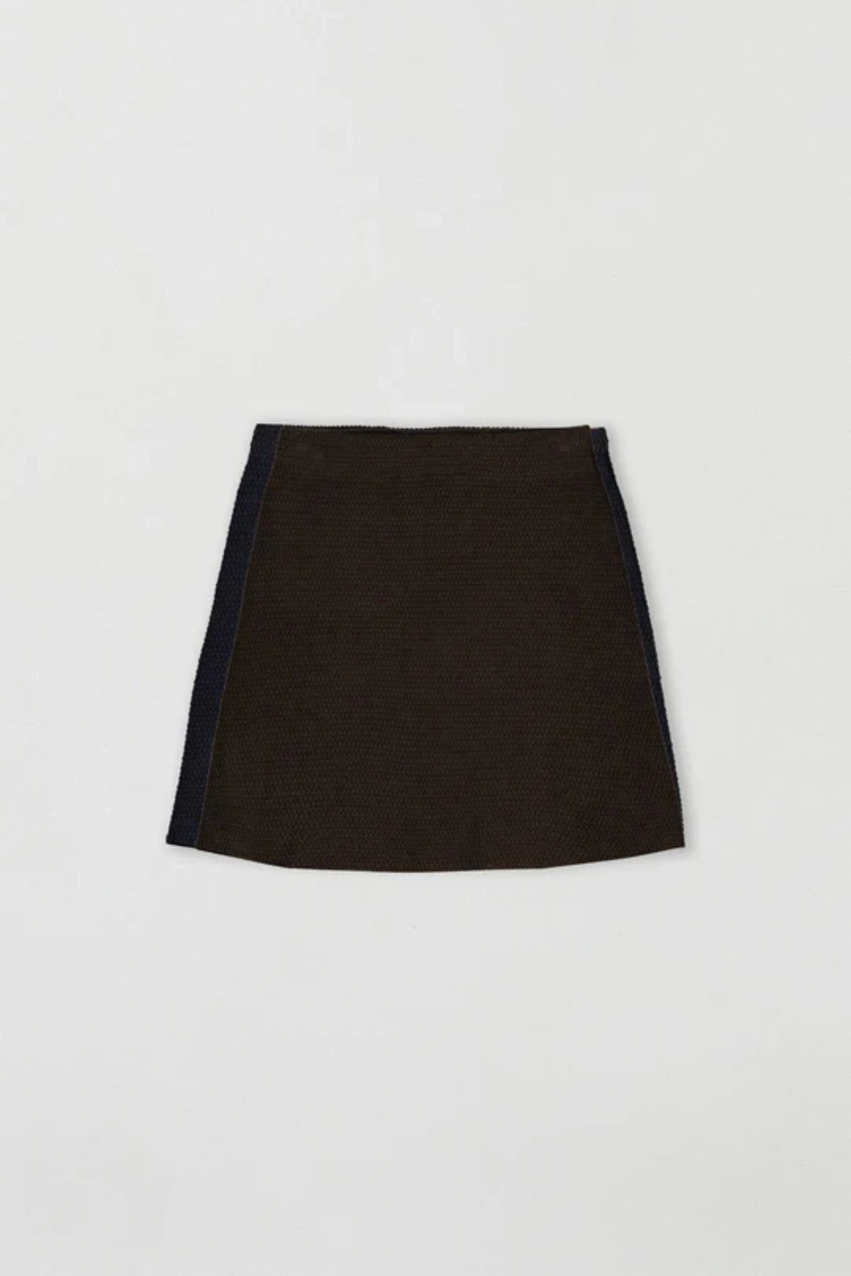 Helena Skirt – Chocolate by Onte, a crochet-knit mini with stretch waist. Perfect for styling with the matching Helena Gilet.