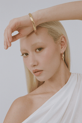 Heritage Bangle by Porter Jewellery, gold vermeil bangle with bold tube design. Perfect for stacking or statement styling.