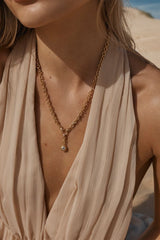 Hesperia Necklace by Amber Sceats - gold necklace with crystal chain and teardrop pendant, designed for elegant elevated styling.