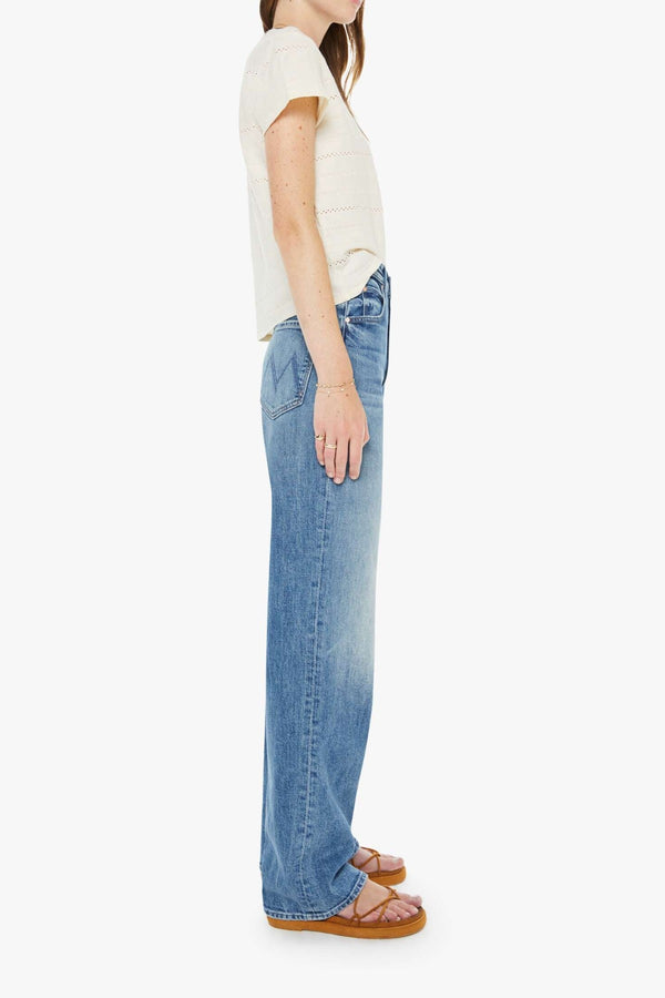 High Waisted Tunnel Vision Sneak Girls Just Want To Have Sun by MOTHER - wide leg jeans in mid blue wash, designed for a high rise fit.