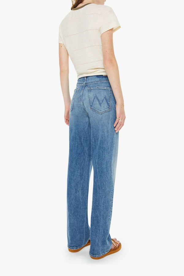 High Waisted Tunnel Vision Sneak Girls Just Want To Have Sun by MOTHER - wide leg jeans in mid blue wash, designed for a high rise fit.