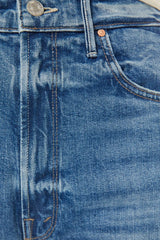 High Waisted Tunnel Vision Sneak Girls Just Want To Have Sun by MOTHER - wide leg jeans in mid blue wash, designed for a high rise fit.