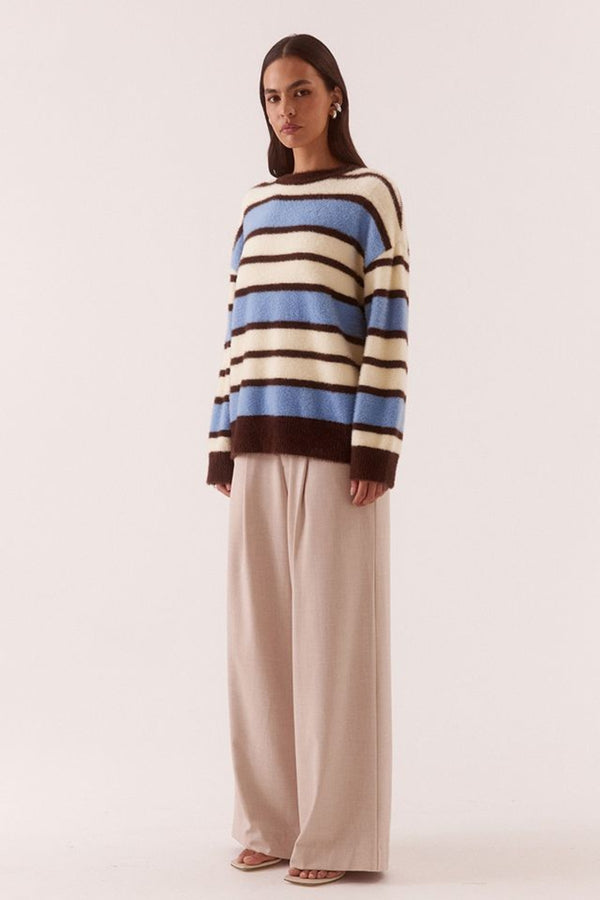 Holland Stripe Crew Knit Blue Yellow by Sovere, striped knit sweater with relaxed fit. Perfect for cozy layering or everyday styling.