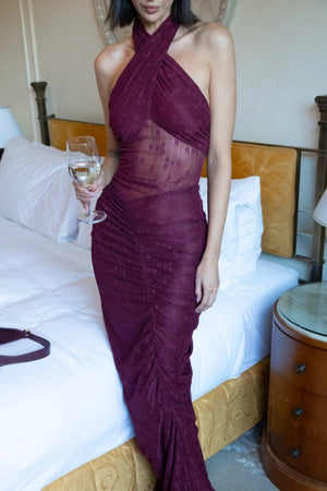 Hudson Lace Maxi Dress Sangria by Benni, sensual stretch lace with twist halter neckline, ruched seams, sheer waist panel for a bold evening look.