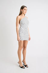 Hugo Mini Dress Polka Dot by Pfeiffer, featuring a one-shoulder neckline and open back. Flattering and sculpted for standout summer style.