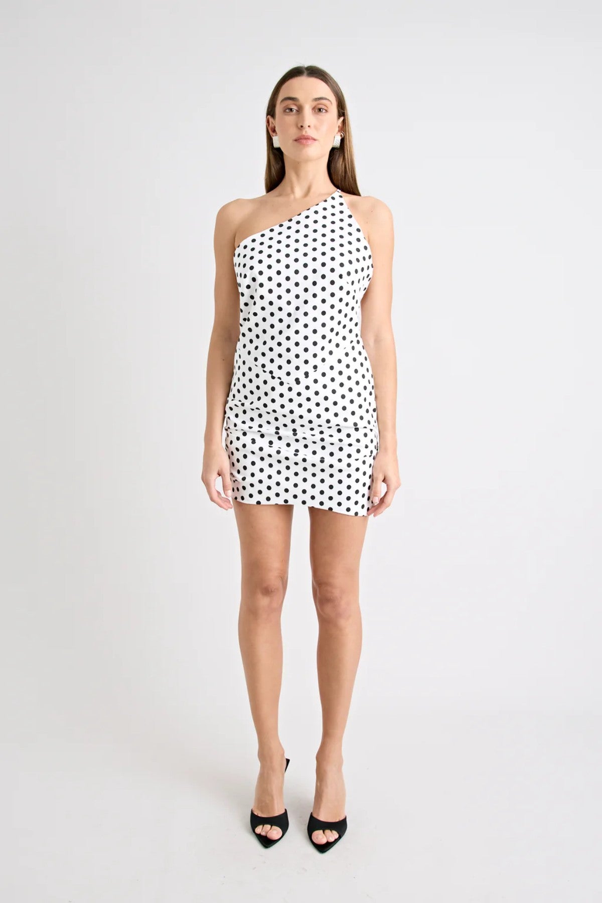 Hugo Mini Dress Polka Dot by Pfeiffer, featuring a one-shoulder neckline and open back. Flattering and sculpted for standout summer style.