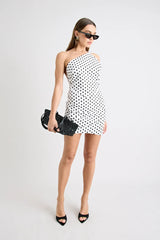 Hugo Mini Dress Polka Dot by Pfeiffer, featuring a one-shoulder neckline and open back. Flattering and sculpted for standout summer style.
