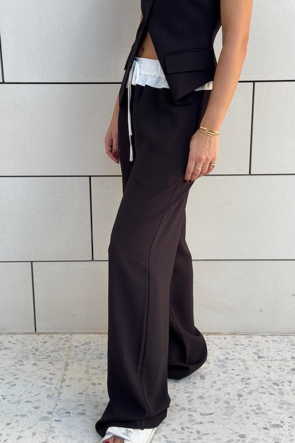 Jade Pant Black by Sneaky Link, relaxed, drapey pants in a luxe poly-viscose blend with elastic waistband, contrast panels, and adjustable drawcord. Designed oversized; size down if between sizes.