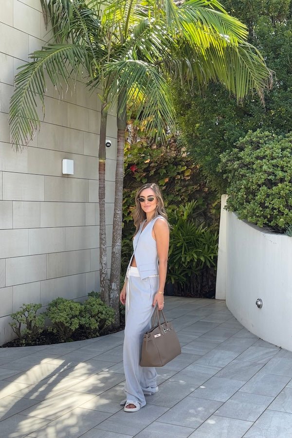 Jade Tailored Vest Steel by Sneaky Link – A relaxed-fit vest in luxe poly-viscose suiting with classic tailoring and front button closure. Pairs perfectly with Jade Pant for a polished, versatile look.