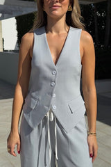 Jade Tailored Vest Steel by Sneaky Link – A relaxed-fit vest in luxe poly-viscose suiting with classic tailoring and front button closure. Pairs perfectly with Jade Pant for a polished, versatile look.