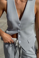 Jade Tailored Vest Steel by Sneaky Link – A relaxed-fit vest in luxe poly-viscose suiting with classic tailoring and front button closure. Pairs perfectly with Jade Pant for a polished, versatile look.