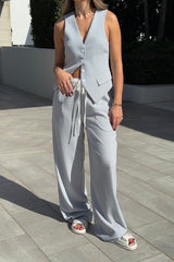 Jade Tailored Vest Steel by Sneaky Link – A relaxed-fit vest in luxe poly-viscose suiting with classic tailoring and front button closure. Pairs perfectly with Jade Pant for a polished, versatile look.