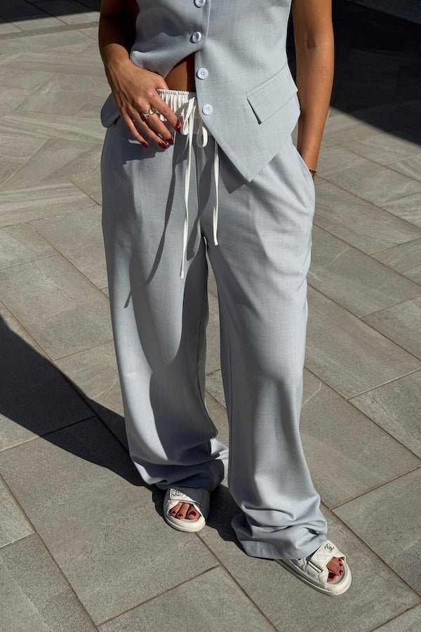 Jade Pant Steel by Sneaky Link, drapey, relaxed pants in luxe poly-viscose with elastic waistband, contrast panels, and adjustable drawcord. Oversized fit; size down if between sizes.