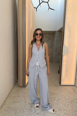 Jade Tailored Vest Steel by Sneaky Link – A relaxed-fit vest in luxe poly-viscose suiting with classic tailoring and front button closure. Pairs perfectly with Jade Pant for a polished, versatile look.