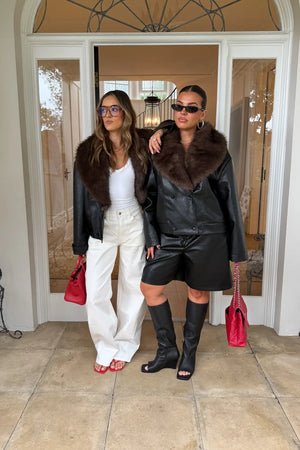 Jaz Faux Fur Collar Jacket in Black with a structured leather look finish and oversized fur collar, creating a bold silhouette that can be worn sleek or elevated.