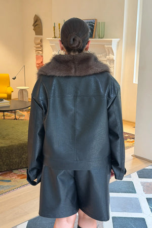 Jaz Faux Fur Collar Jacket in Black with a structured leather look finish and oversized fur collar, creating a bold silhouette that can be worn sleek or elevated.