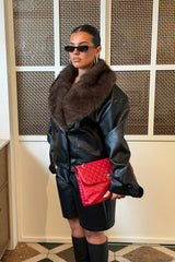 Jaz Faux Fur Collar Jacket in Black with a structured leather look finish and oversized fur collar, creating a bold silhouette that can be worn sleek or elevated.