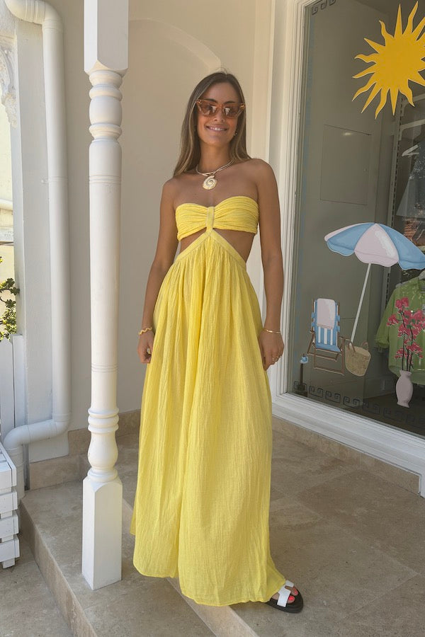 Chloe Dress Lemon by D'Artemide – Cotton strapless dress with ruched back, maxi skirt, side split, and low back detail.