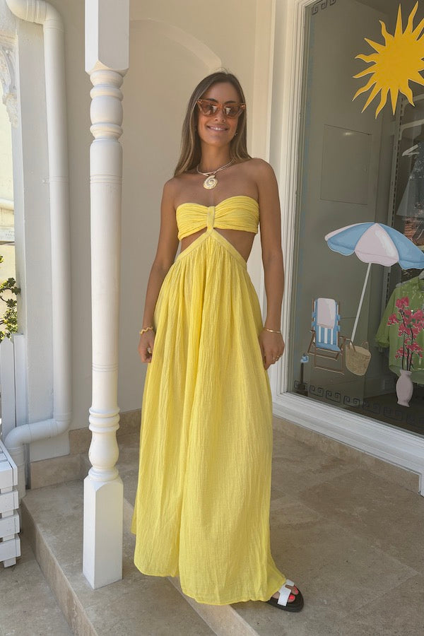 Chloe Dress Lemon by D'Artemide – Cotton strapless dress with ruched back, maxi skirt, side split, and low back detail.