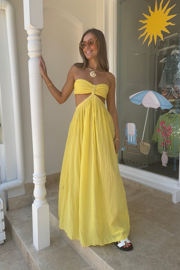 Chloe Dress Lemon by D'Artemide – Cotton strapless dress with ruched back, maxi skirt, side split, and low back detail.