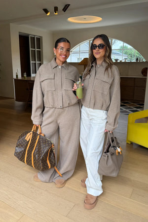 Jaz Lounge Bomber Jacket in oat marle color with ribbed cuffs and collar, front zipper, and relaxed fit.