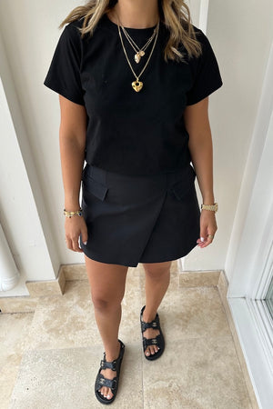 Black Tee by Sneaky Link – Trendy loose-fit 100% cotton classic black tee, a versatile essential for any capsule wardrobe and everyday casual looks.