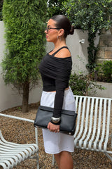 Jaz Layered Long Sleeve Top in Black with a soft off shoulder layered neckline and fitted long sleeves, creating a smooth, sculpted silhouette with a clean, modern edge.