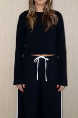 Claudia Long Sleeve Top Black by Sneaky Link – Soft cotton-spandex blend with relaxed fit and cropped length. Perfect for viral autumn layering and casual chic.