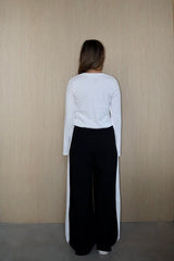 Claudia Long Sleeve Top White by Sneaky Link – Soft cotton-spandex blend, relaxed fit with cropped length. Perfect for viral autumn layering and everyday ease.