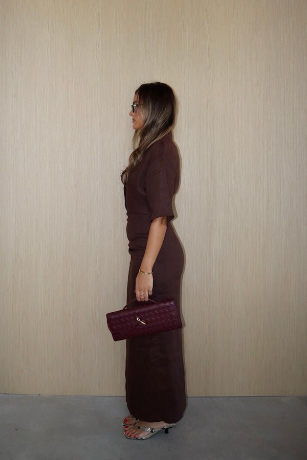 Lefka Midi Dress Chocolate by Sneaky Link – A trendy, breathable linen midi with flattering skirt tucks and button-front neckline, perfect for sunny lunches and relaxed summer days.