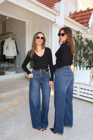 Christina Long Sleeve Top by Sneaky Link, fitted V-neck long sleeve in soft, stretchy cotton rib—perfect for layering or wearing solo.