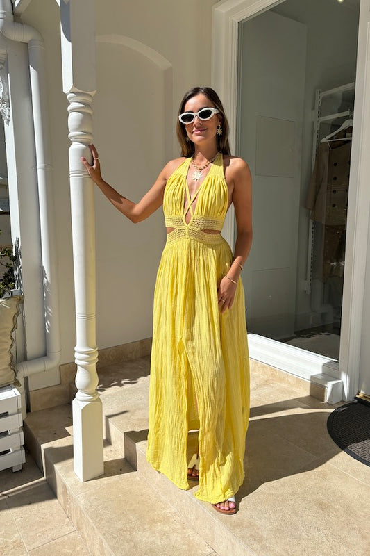 Artemis Dress Lemon by D'Artemide – Cotton halterneck dress with cutout detailing and front split for a bold, stylish look.
