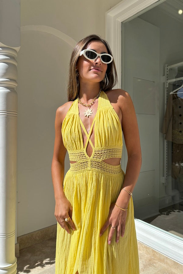 Artemis Dress Lemon by D'Artemide – Cotton halterneck dress with cutout detailing and front split for a bold, stylish look.