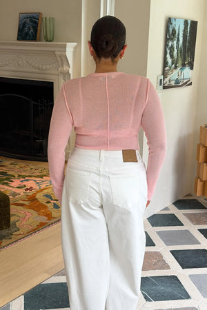 Light pink Jaz fine knit sheer long sleeve top with a delicate, lightweight texture and fitted silhouette.