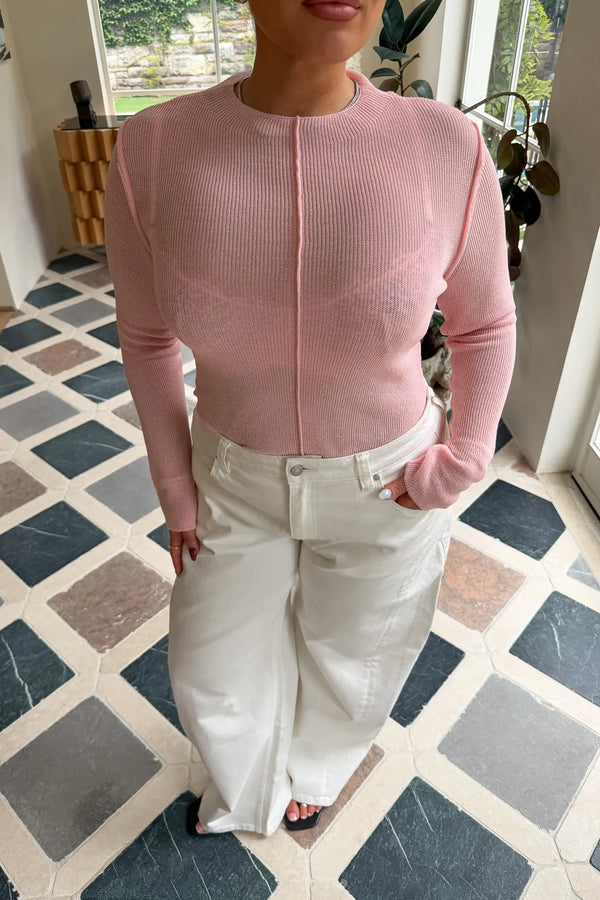 Light pink Jaz fine knit sheer long sleeve top with a delicate, lightweight texture and fitted silhouette.