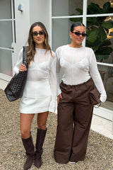 Jaz Mid Rise Relaxed Suit Pant in Chocolate with a mid rise waist and straight leg fit, creating a relaxed, fluid silhouette with a soft, tailored finish.