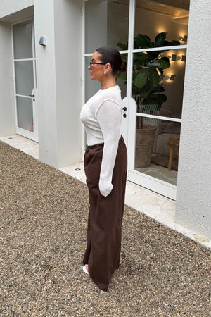 Jaz Mid Rise Relaxed Suit Pant in Chocolate with a mid rise waist and straight leg fit, creating a relaxed, fluid silhouette with a soft, tailored finish.