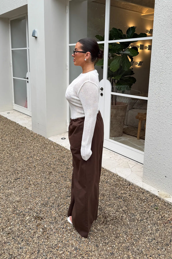 Jaz Mid Rise Relaxed Suit Pant in Chocolate with a mid rise waist and straight leg fit, creating a relaxed, fluid silhouette with a soft, tailored finish.