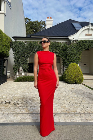 Verona Gown Red by Effie Kats – Stretch-crepe gown with high neckline and ‘90s-inspired fit, made for sleek evening dressing.