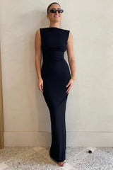 Verona Gown Black by Effie Kats – Fitted stretch-crepe gown with high neckline and minimalist ‘90s-inspired silhouette.