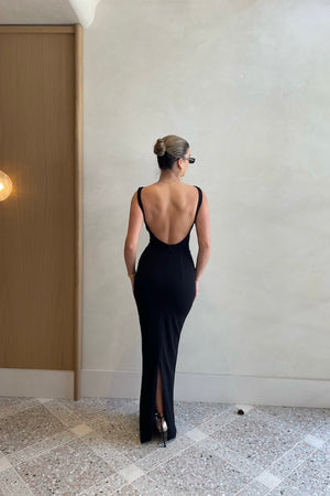 Verona Gown Black by Effie Kats – Fitted stretch-crepe gown with high neckline and minimalist ‘90s-inspired silhouette.