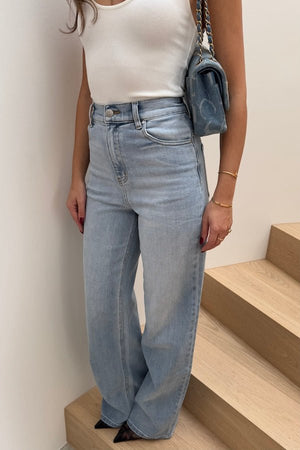 Celine High Rise Stretch Jean Light Blue by Sneaky Link, these flattering jeans feature a subtle flare and a premium stretch cotton blend for comfort and shape retention. Perfect for day to night wear.