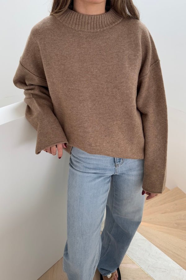 Pia Knit Sweater Beige by Sneaky Link — Soft, cozy wool blend with ribbed neckline, rolled cuffs, and oversized fit. Perfect for layering on cool days.