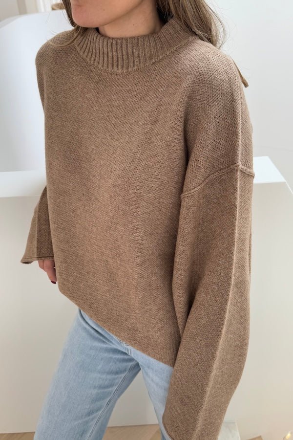 Pia Knit Sweater Beige by Sneaky Link — Soft, cozy wool blend with ribbed neckline, rolled cuffs, and oversized fit. Perfect for layering on cool days.