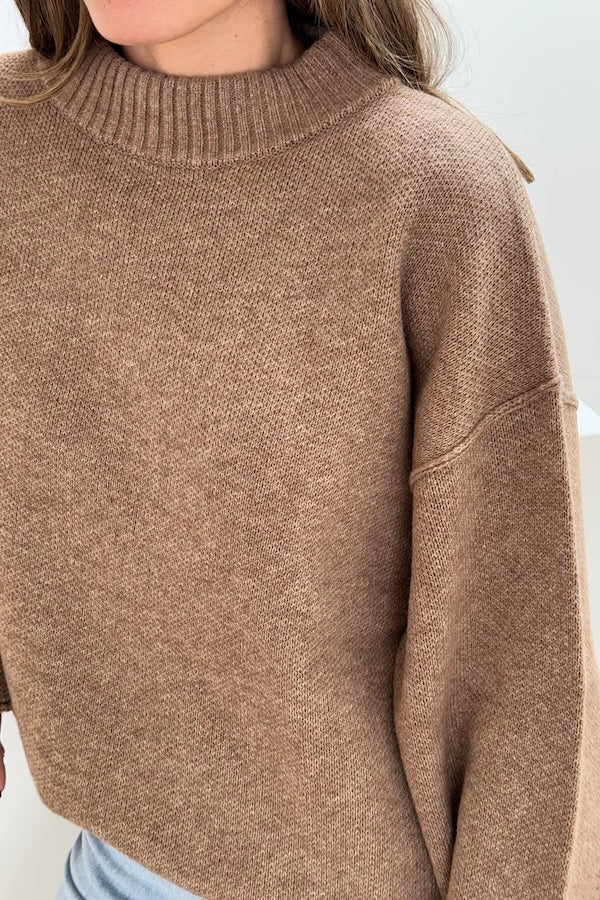 Pia Knit Sweater Beige by Sneaky Link — Soft, cozy wool blend with ribbed neckline, rolled cuffs, and oversized fit. Perfect for layering on cool days.