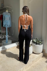 Charlie Halter Top Black/White by Sneaky Link - Trendy summer staple with chic halter neckline and open back. Perfect for beach days or viral nightlife vibes.