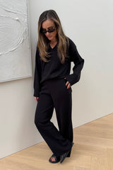Lilly Knit Pant Black by Sneaky Link, luxe viscose knit with relaxed wide-leg fit, elasticated high waist for comfort. Perfect for errands or lounging in style.